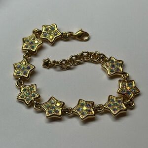 Kirk’s Folly star and rhinestone panel link bracelet gold tone